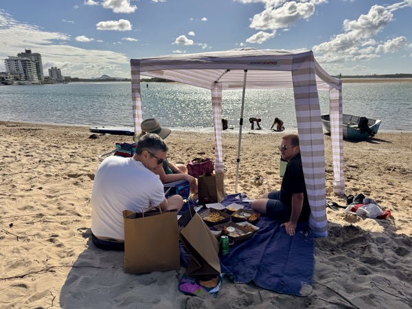Beach setup at Cotton Tree with a Cool Cabana shade tent and Tommy Bahama beach chair