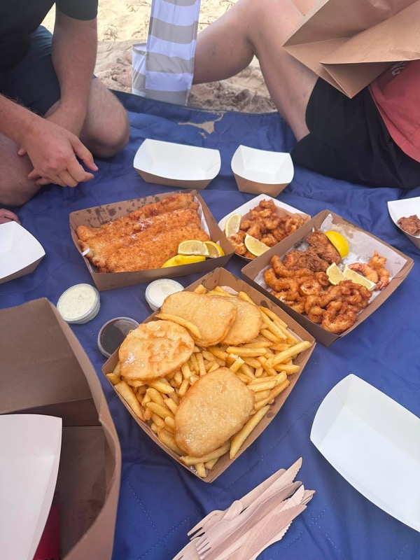 Fish and chips with calamari and potato scallops at Cotton Tree beach, Sunshine Coast